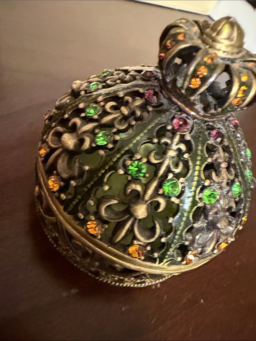Decorative Filigree Trinket Box with Green and Gold Accents